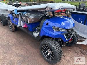 lot 125 image: Off road 6 passenger electric golf ...
