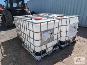 lot 243C image: 4X Caged poly tanks....