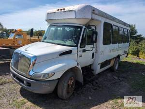 lot 244 image: IH 3200 bus, used as camper. DT466 ...