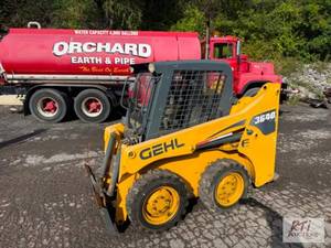 lot 81 image: GEHL 3640 Wheeled skid steer. Quick...