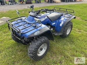 lot 103 image: 1990 Honda 300 4-wheeler, 4WD, manu...