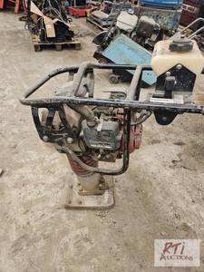 lot 214 image: Jumping jack tamper with small gas ...