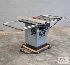 lot 234 image: Delta 34-806 Unisaw 10in tilting ar...