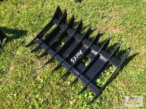 lot 151 image: 32in root rake for mini skid loader...