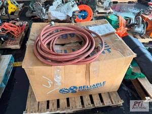 lot 31 image: Box of Hose Bags and a Garden hose....