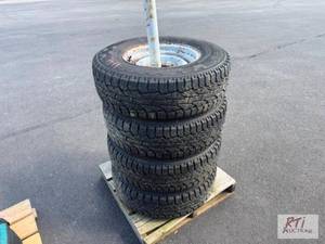 lot 144 image: 4 Tires on rims 24575 R16 &nbsp#1...