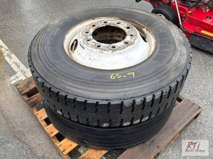 lot 974 image: (2) 11R 22.5 truck tires...