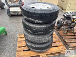lot 978 image: (4) Paragon 23570R 16 tires on For...