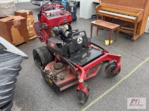 lot 988 image: Toro Grand Stand stand-on zero turn...