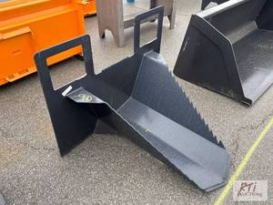 lot 1004 image: Tree spade for skid loader...