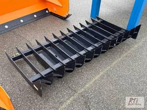lot 1023 image: 70-inch root rake for skid loader...
