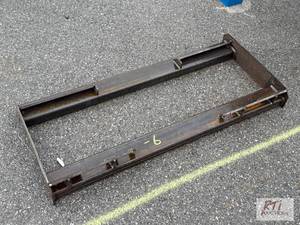 lot 1028 image: Skid loader mounting plate...
