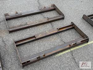 lot 1029 image: 2X skid loader mounting plate...