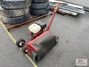 lot 1041 image: Brown F7188 bed edger...