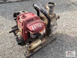 lot 1142 image: Honda 1in water pump...