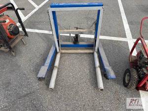 lot 1162 image: OTC dual wheel tire jack...