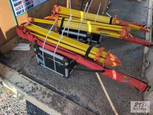 lot 72 image: Laser transit with tripod and gradi...