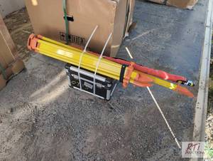lot 78 image: Laser transit with tripod and gradi...