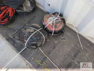 lot 179 image: (8) 13ft 200 amp jumper cables MDI...