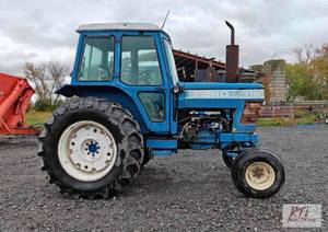 lot 197 image: Ford 7710 Tractor. Enclosed cab wit...