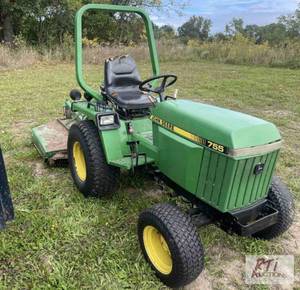 lot 213 image: John Deere 755 tractor, rotary mowe...
