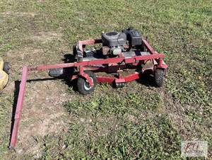 lot 275 image: Swisher mower with extra blades. 60...