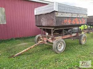 lot 303 image: 125 Bushel Gravity Wagon. Sperry Ra...
