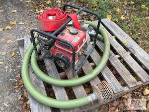 lot 514 image: Trash pump and hose, 2in diameter. ...