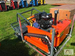 lot 74 image: LM1000Q remote controlled track bru...
