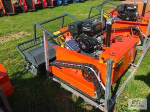 lot 77 image: LM1000Q remote controlled track bru...