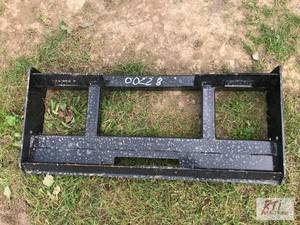 lot 217 image: Wolverine skid loader fork carriage...