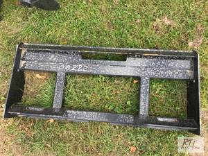 lot 218 image: Wolverine skid loader fork carriage...