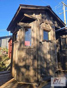 lot 335 image: 5 ft x 5 ft hunting shack. 8 window...