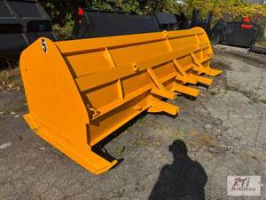 lot 452 image: 16ft bucket mount snow pusher. Bolt...