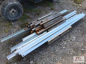 lot 533 image: Pile of 82in angle iron and 29in bo...
