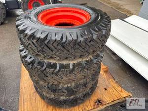 lot 578 image: Bobcat Foam Filled Tires and Rims. ...