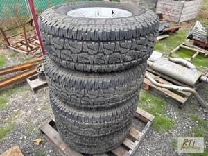 lot 585 image: (4) Bridgestone Dueler AT tires, L...