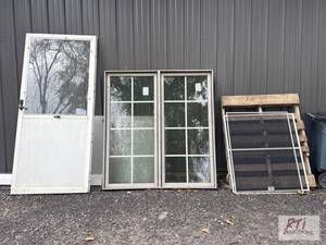 lot 762 image: Lot of (3) windows, (2) storm doors...