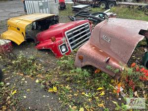 lot 782 image: (3) Truck hoods. (Lot 52) Located i...